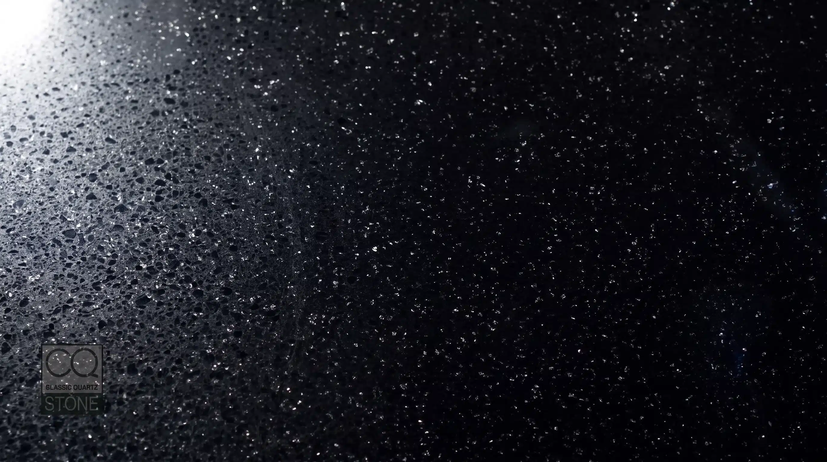 Close-up of Glitter Noir CQC137 quartz worktop surface detail