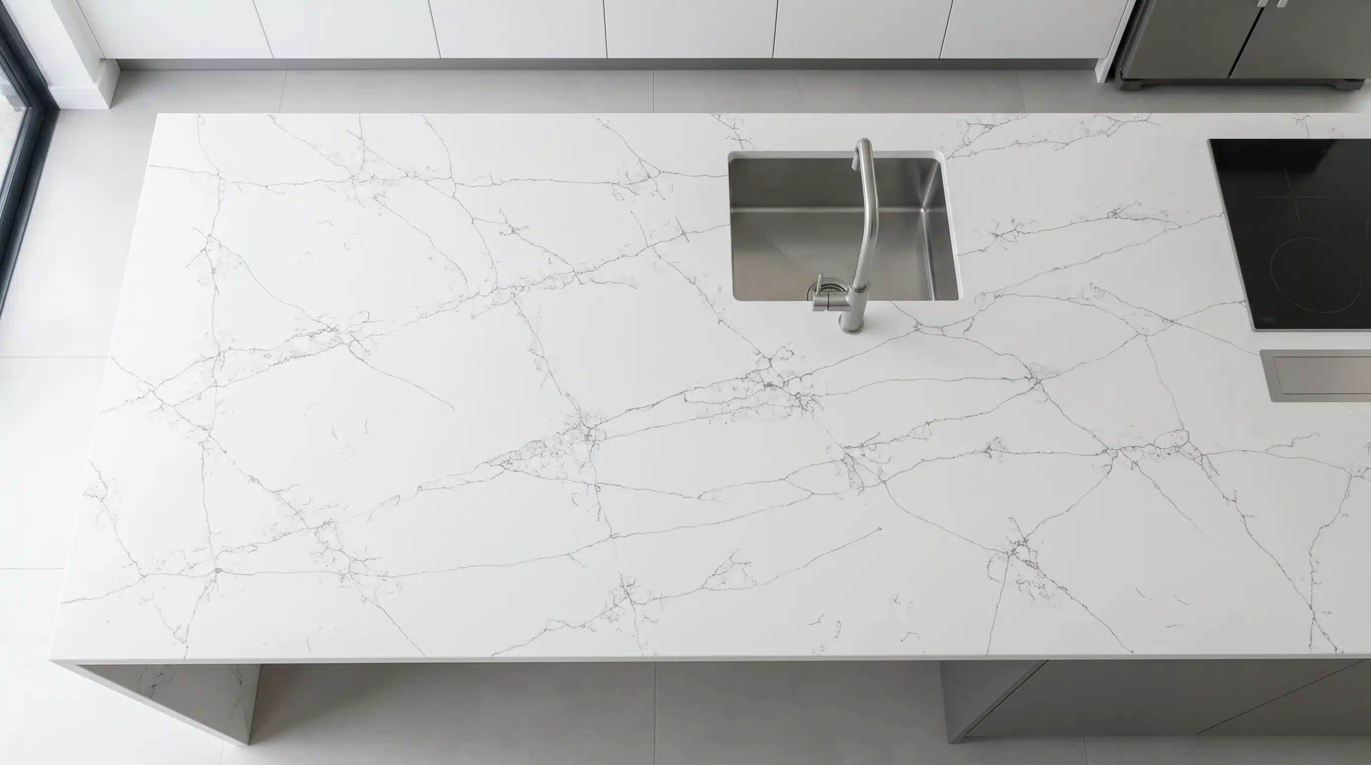 Overhead view of Bianco Drift CQC139 quartz worktop in a fitted kitchen