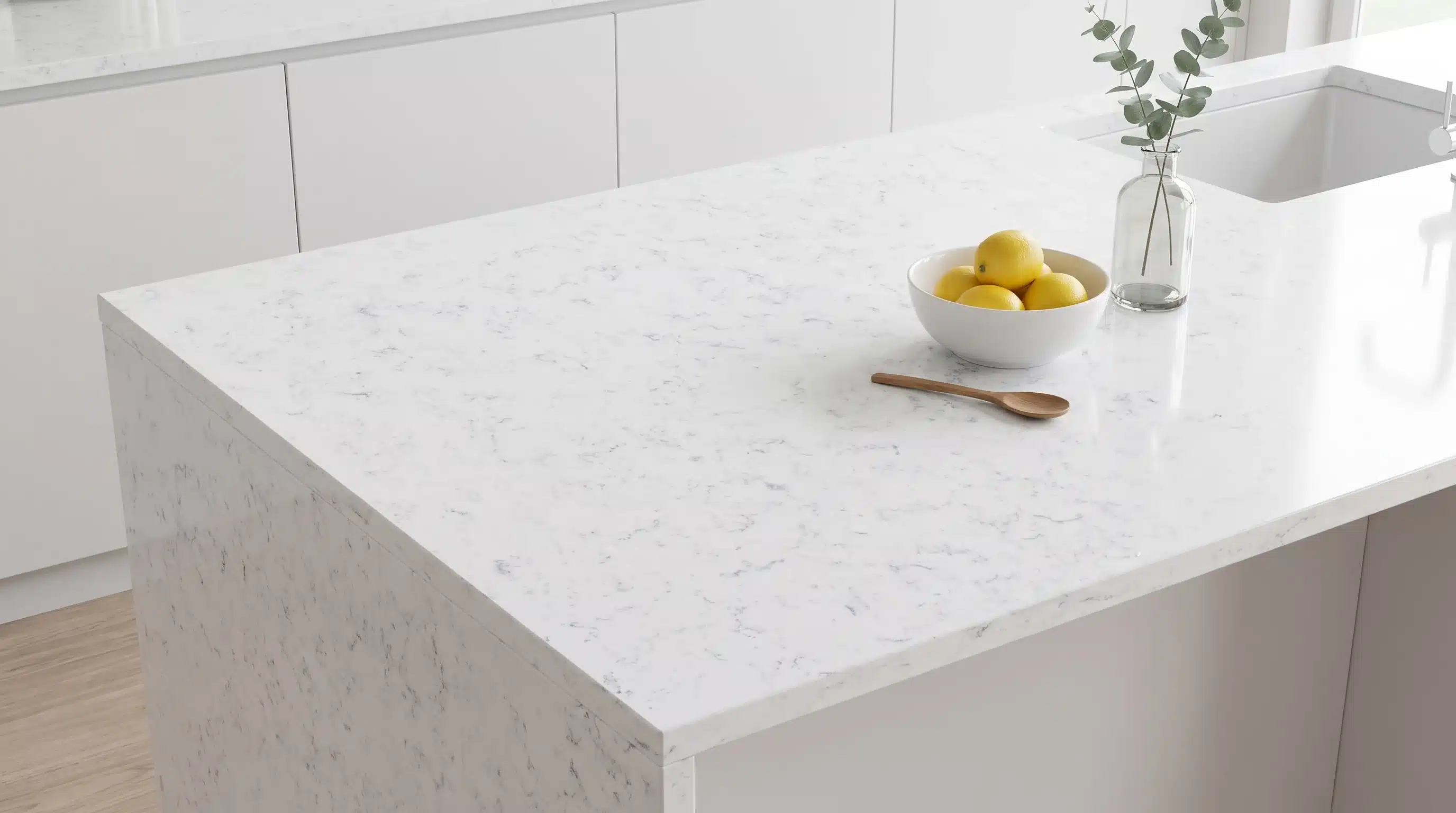 Overhead view of Marble Carrara CQM300 quartz worktop in a fitted kitchen