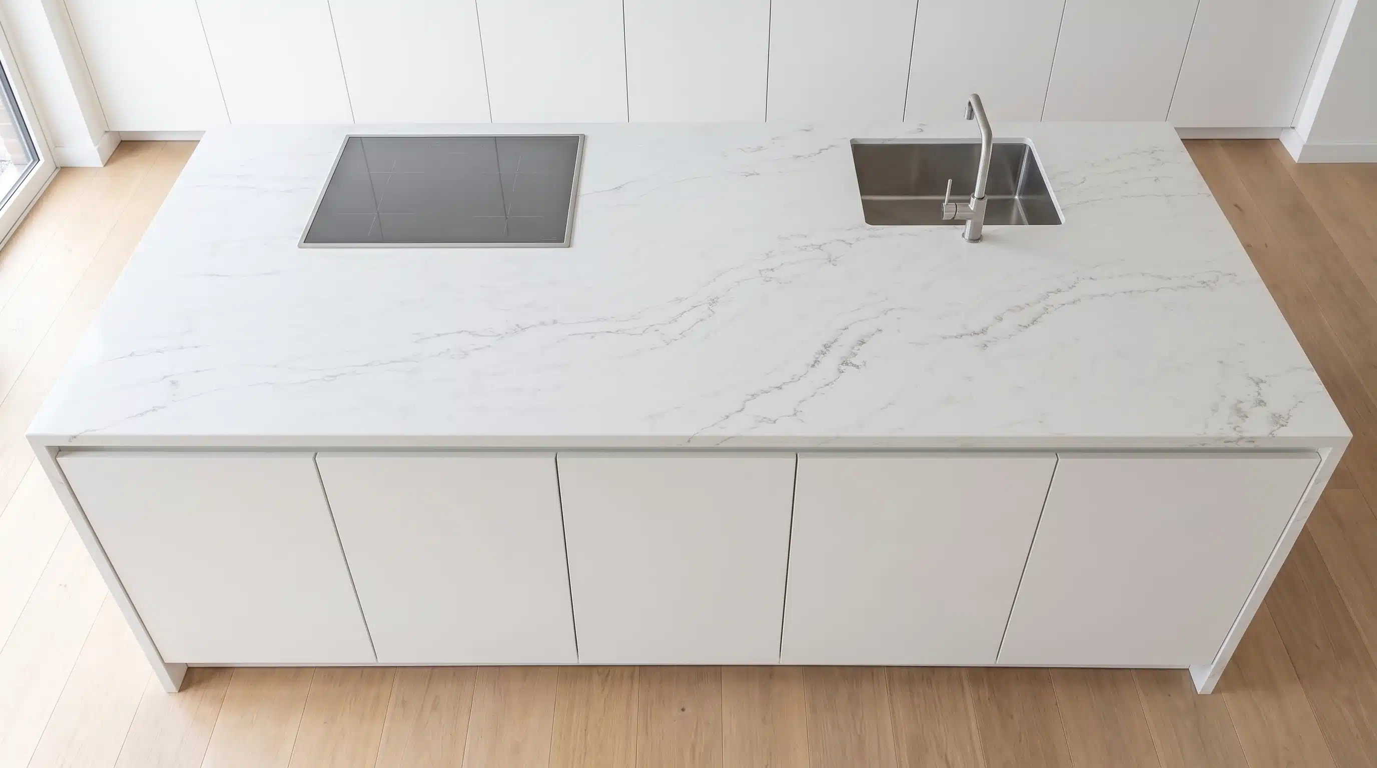 Overhead view of Calacatta Milan CQM312 quartz worktop in a fitted kitchen