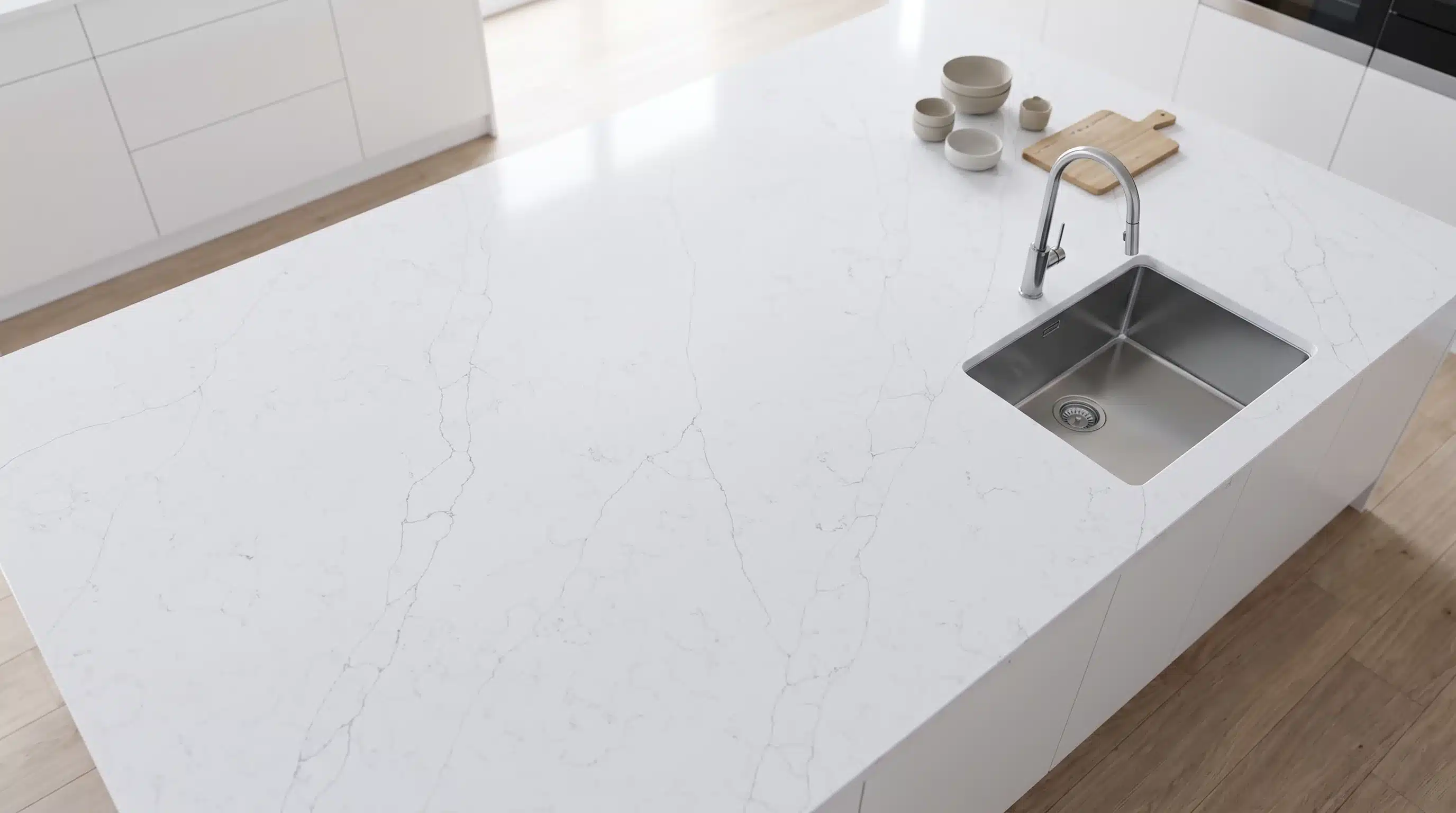 Overhead view of Alaska Bianca CQM424 quartz worktop in a fitted kitchen