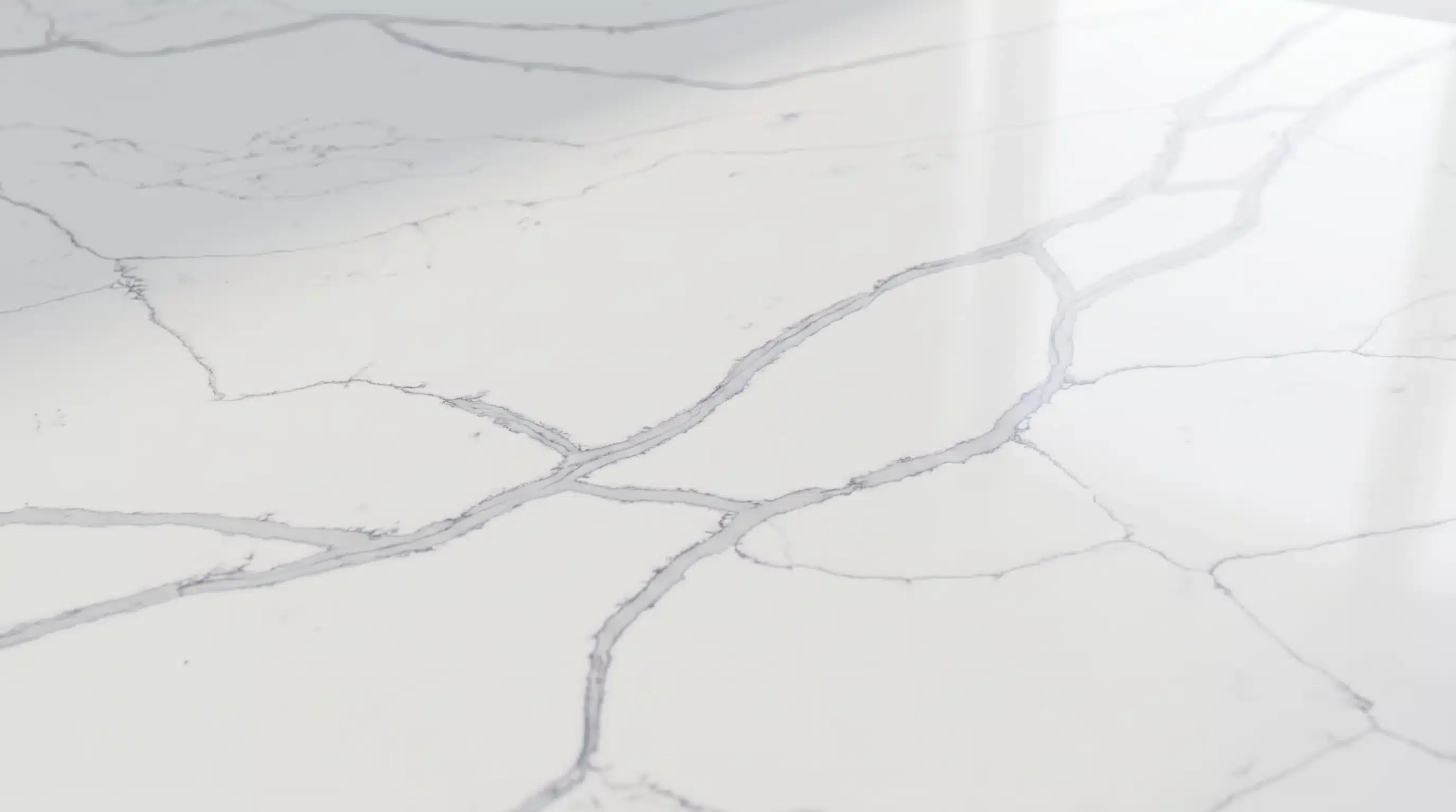 Close-up of Statuario Venato CQM427 quartz worktop surface detail
