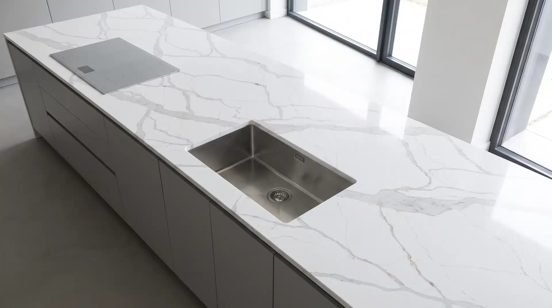 Overhead view of Torrano Grey CQM447 quartz worktop in a fitted kitchen