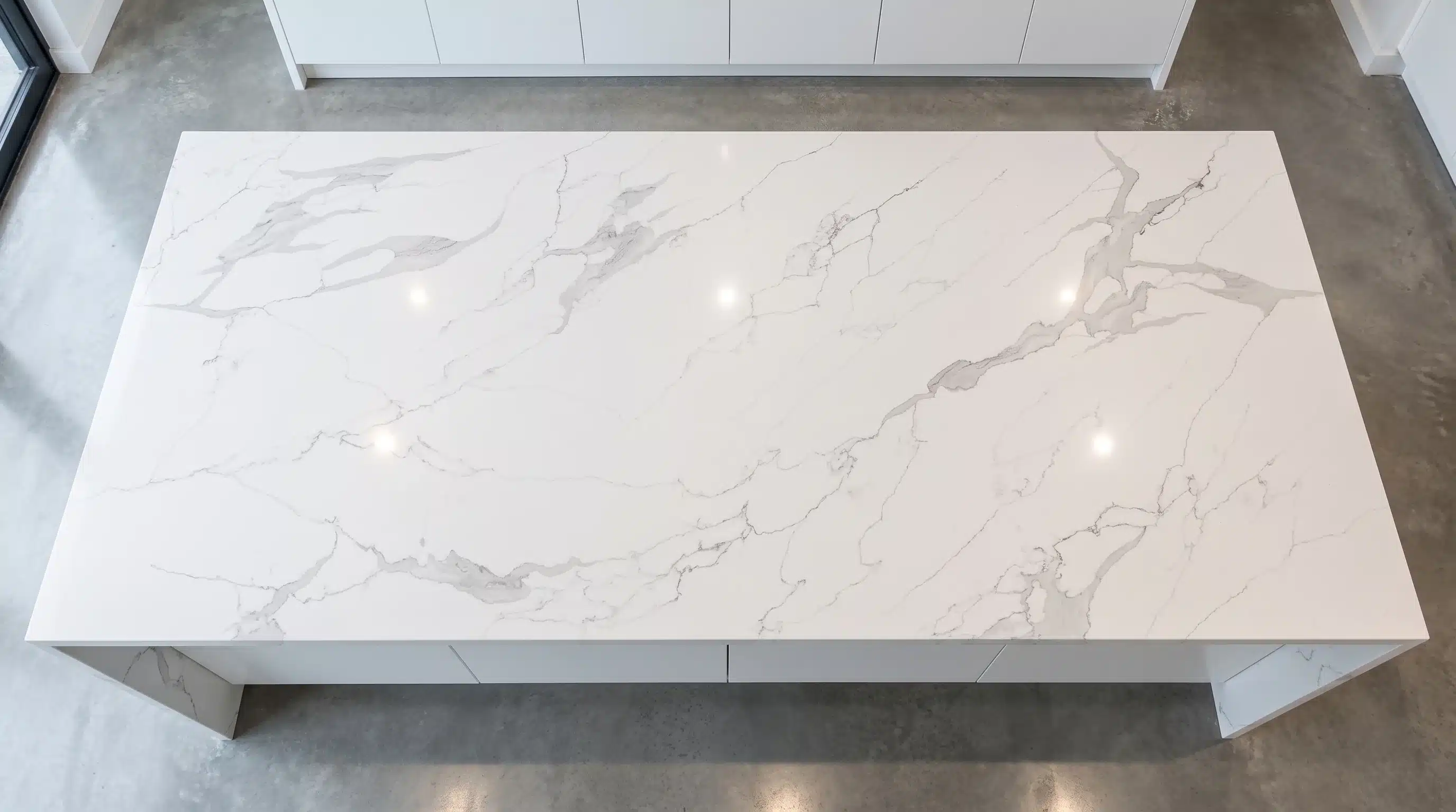 Overhead view of Dior CQM456 quartz worktop in a fitted kitchen