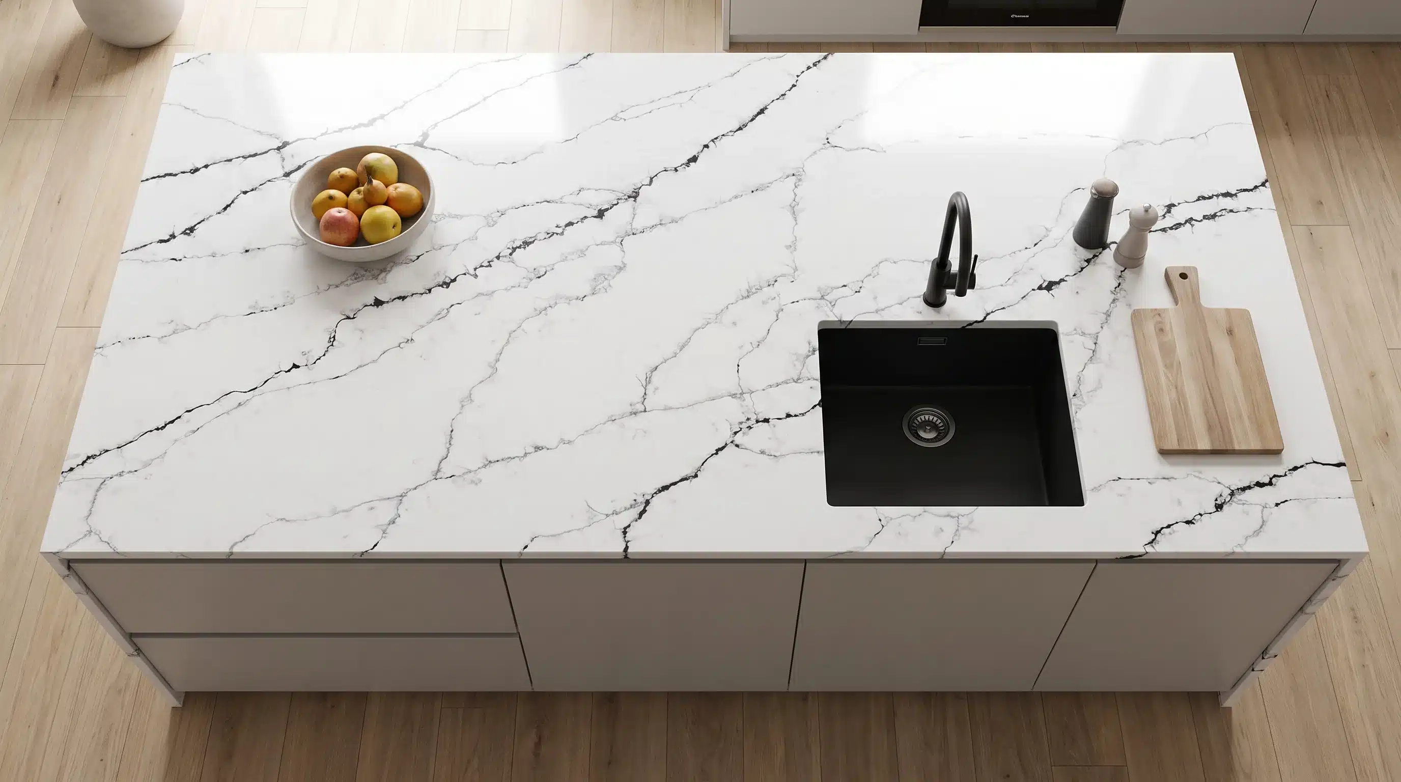 Overhead view of Calacatta Noir CQM466 quartz worktop in a fitted kitchen