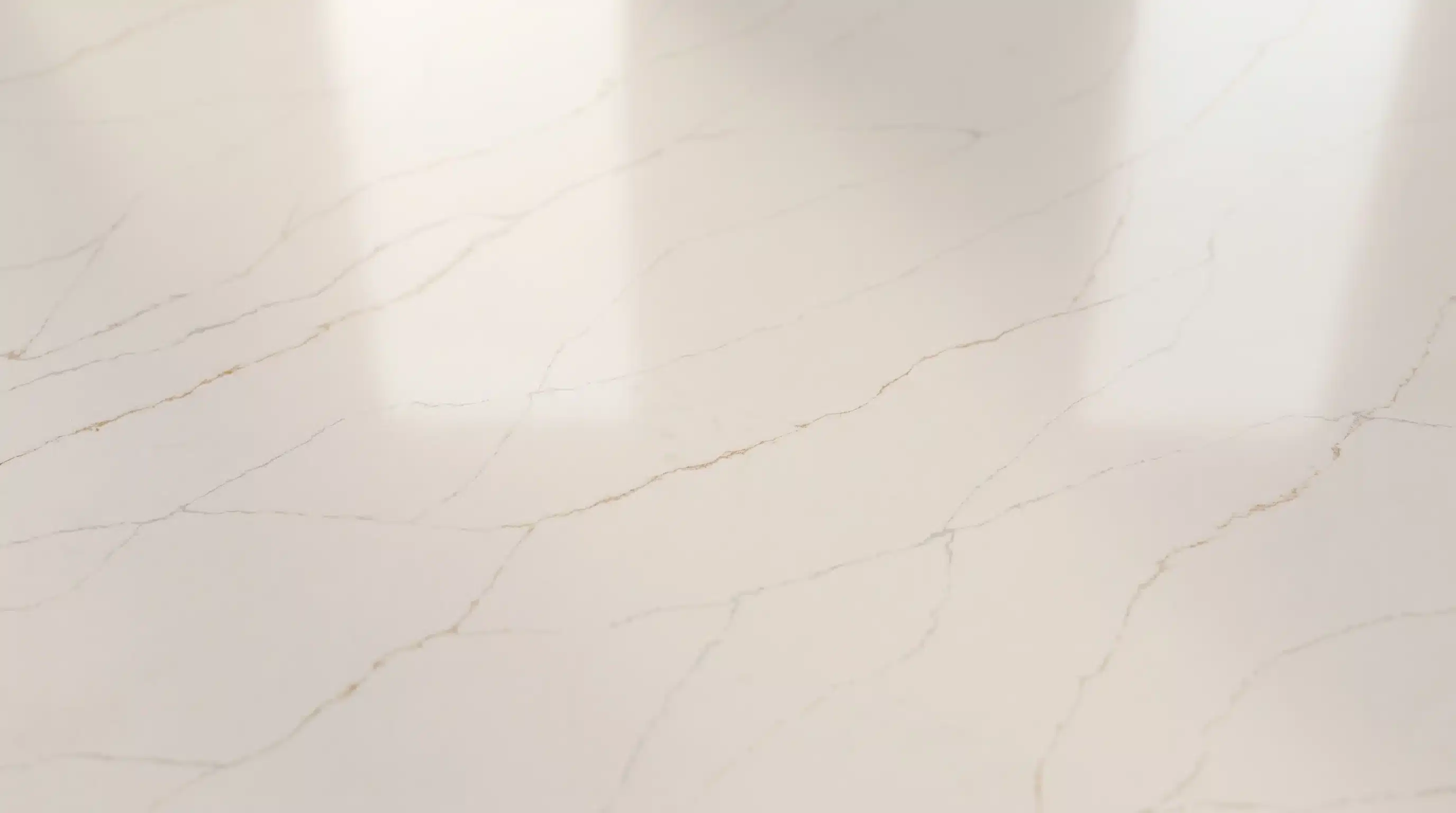 Close-up of Calacatta Soft CQM476 quartz worktop surface detail