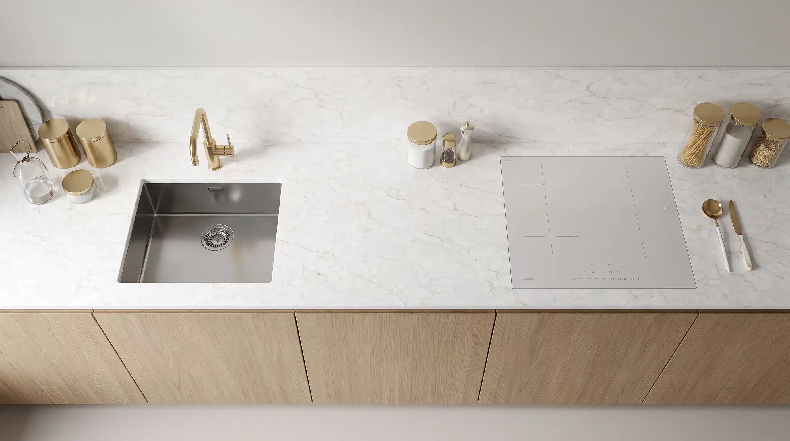 Overhead view of Deluxe Gold CQM479 quartz worktop in a fitted kitchen