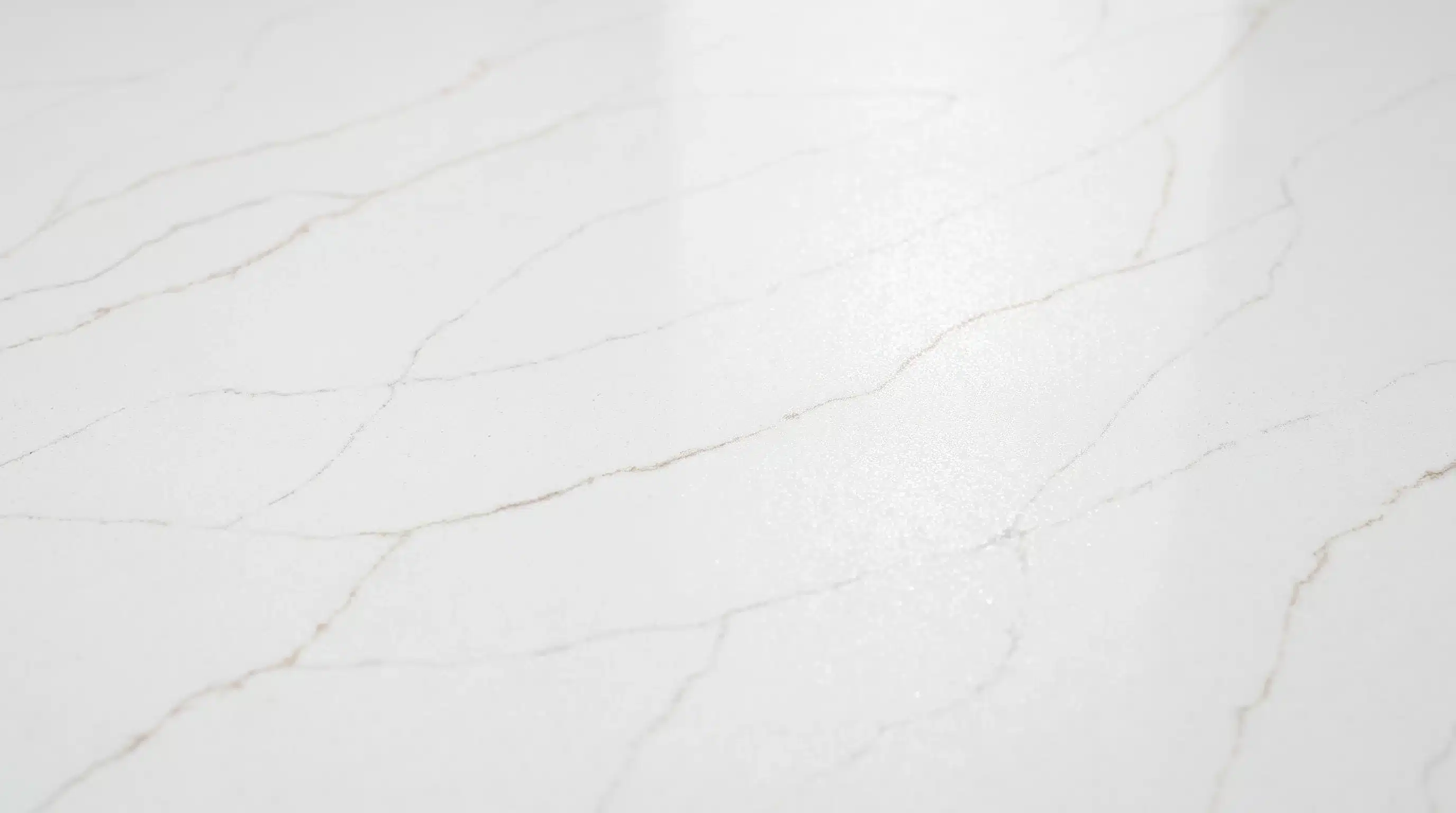 Close-up of Calacatta Soft Shimmer CQM481 quartz worktop surface detail