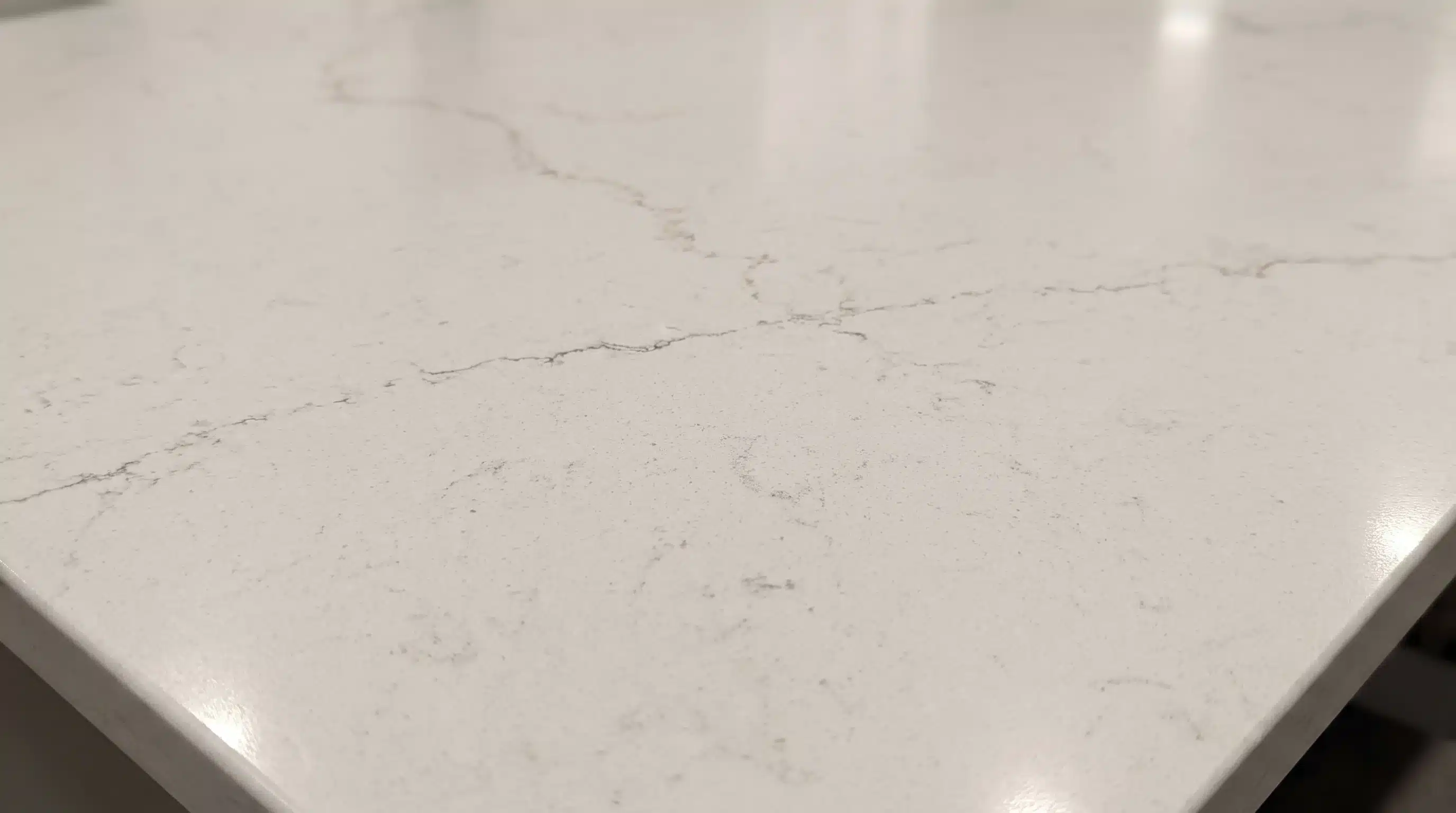 Close-up of Misterio Mix CQM521 quartz worktop surface detail