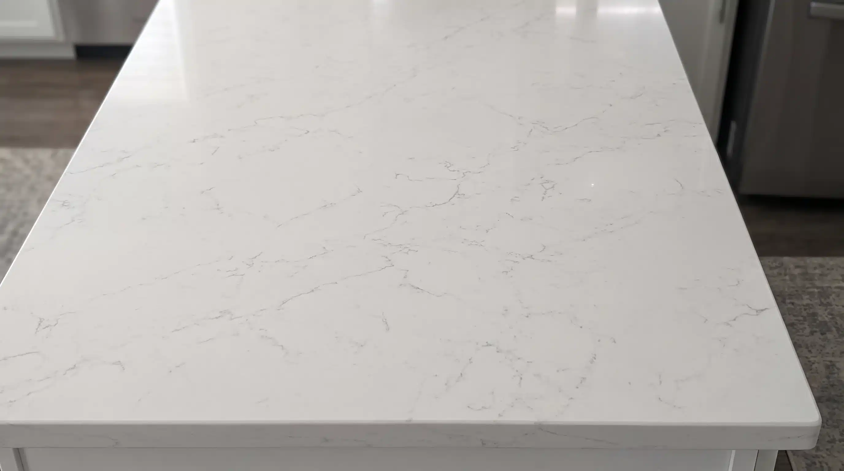 Close-up of Light Carrara CQP205 quartz worktop surface detail