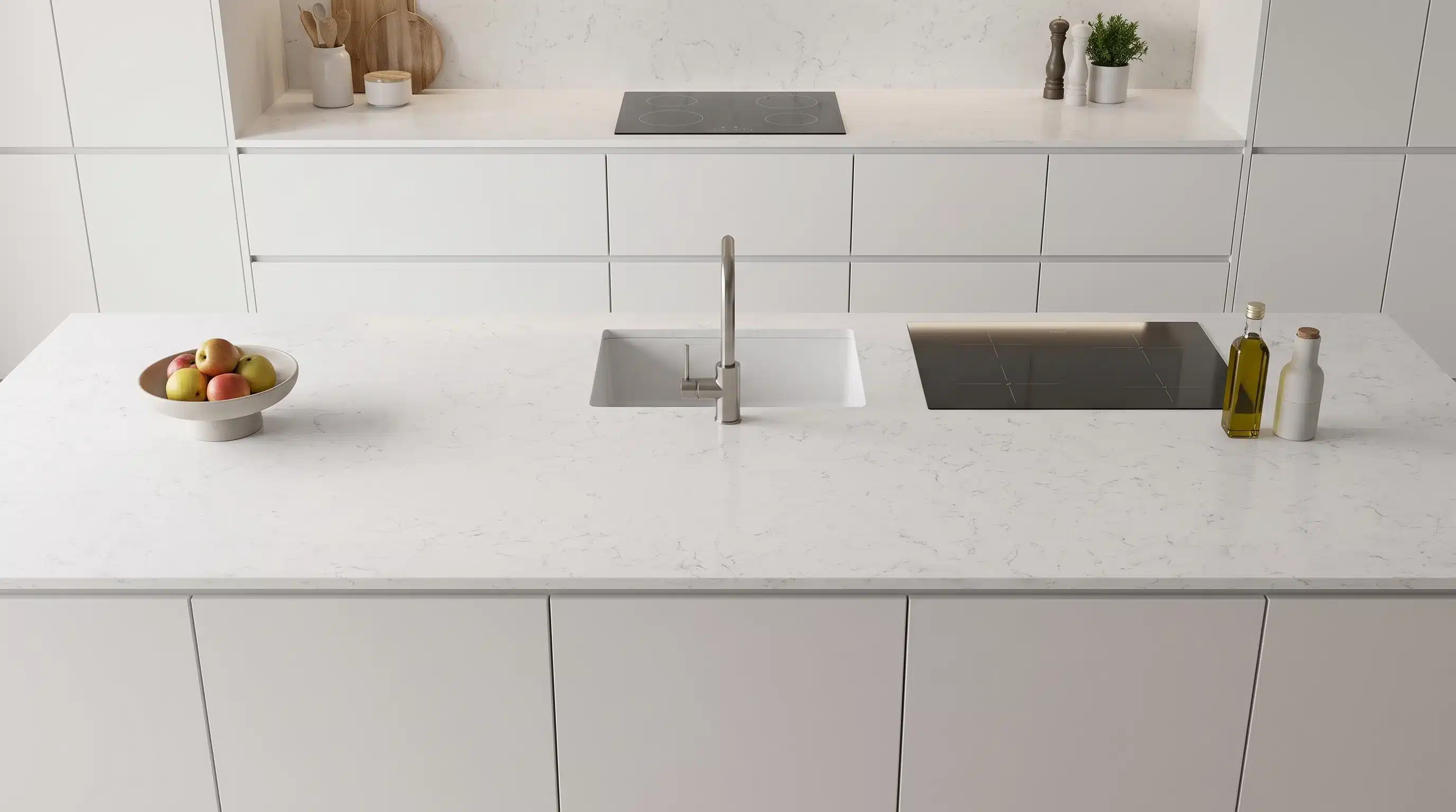 Overhead view of Light Carrara CQP205 quartz worktop in a fitted kitchen